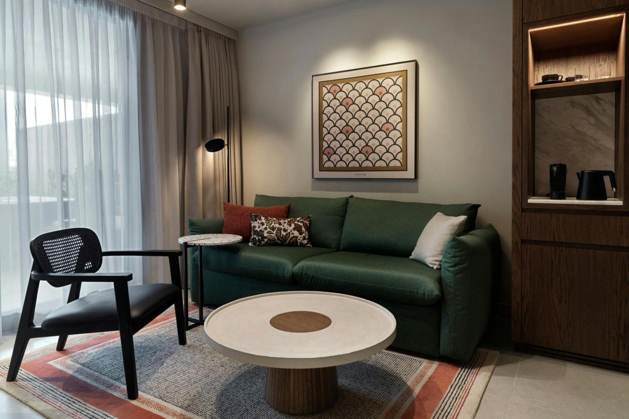 Hotel Monasty, Thessaloniki, Autograph Collection Exteriér fotografie A living room at the hotel